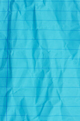 Retro blue lined school crumpled paper background