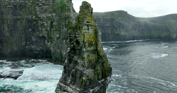 Flying over the Branaunmore sea stack of the Cliffs of Moher 4k