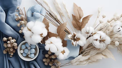 Gartenposter A table topped with a bowl of cotton flowers © Maria Starus