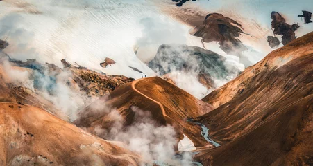 Crédence de cuisine en verre imprimé Gris foncé Landscape of Kerlingarfjoll volcanic mountain range with sulfur smoke and tourist hiking in summer at Icelandic Highlands