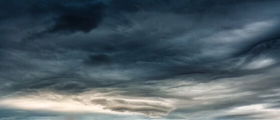 Dark dramatic sky with heavy cloud and storm formation in moody weather