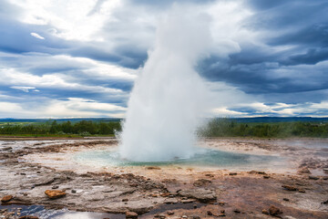 Strokkur Geyser eruption, natural hot spring pulsing in national park