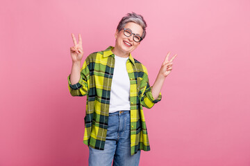 Photo of cheerful optimistic woman with short hairstyle wear checkered shirt two arms showing...