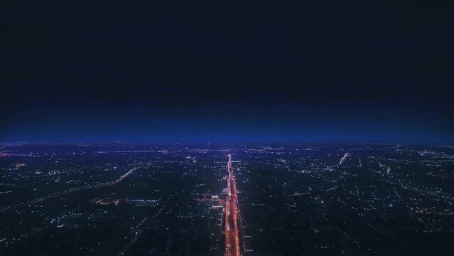 AERIAL. Epic sunset, fast time changing from evening to night. Top view of city huge city at night time