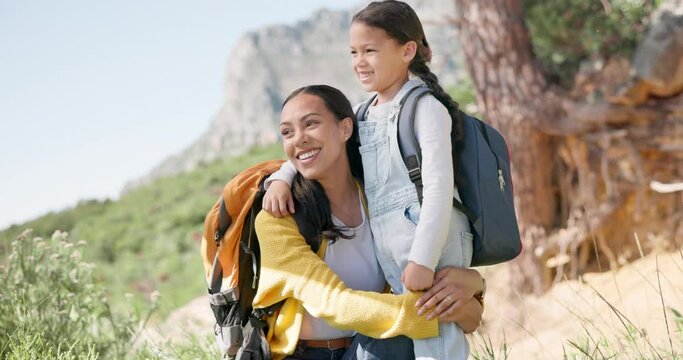 Hiking, high five and mother with girl child in nature for celebration, freedom or success. Happy family, hands and mom with kid in a forest excited for travel, trekking or backpacking adventure