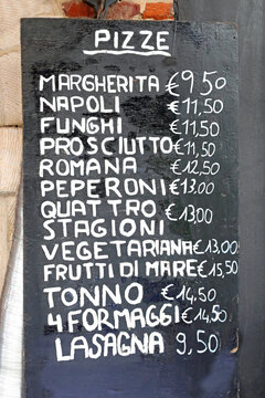pizzeria board with the list of all the pizzas with the various flavors written in Italian and the price in euros
