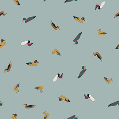 Fototapeta premium This Soft Teal Blue Background Features a Ditsy Pattern of Vintage Duck Decoys Scattered across it Creating a Vector Seamless Repeat Pattern Design