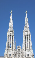 Fototapeta na wymiar Bell towers in Vienna Austria of the votive church called votivkirche in Austrian