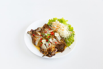 Blue Crab Salad on a white plate. ready-to-eat local food of Isaan people