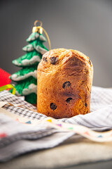 panettone christmas baking sweet pastry dried fruits chocolate Christmas sweet dessert holiday treat new year celebration meal food snack on the table copy space food background rustic top view