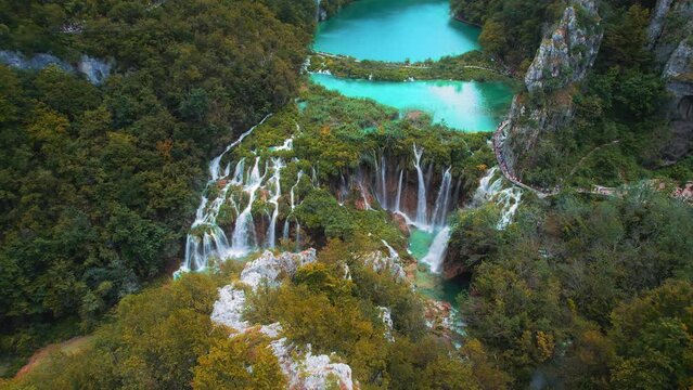 Autumn Plitvice Lakes National Park in Croatia. Picturesque tufa lakes, caves, connected by waterfalls.