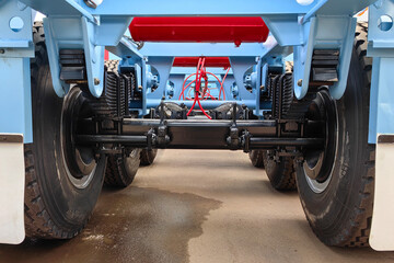 Container trailer frame and chassis, leaf springs, suspension system and pneumatic brake line.
