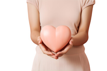  woman dressed in a soft shade of pink, cradling a wooden pink heart in her hands. women's health and well-being, exuding warmth, care, and positivity.PNG.Isolated