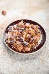cane sugar crystal rock pieces candy brown sugar candied big rock caramel crystalssugar  taste eating cooking appetizer meal food snack on the table copy space food background rustic top view
