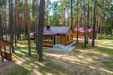 wooden eco country houses in forest