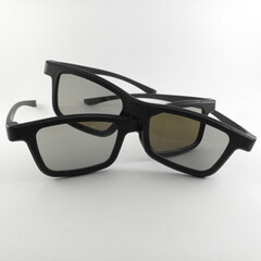Cinama and movie glasses on white background