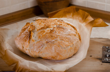 Homemade handmade craft bread on a wooden board
