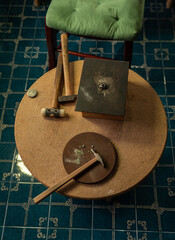 Chair and table of a handicraft workshop where jewelry and goldsmith pieces are made.
