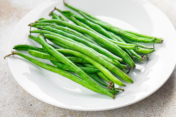 green beans raw fresh bean pod  eating cooking diet meal food snack on the table copy space food background rustic top view keto or paleo diet vegetarian vegan food
