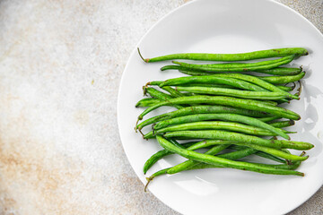green beans raw fresh bean pod  eating cooking diet meal food snack on the table copy space food background rustic top view keto or paleo diet vegetarian vegan food