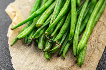 green beans raw fresh bean pod  eating cooking diet meal food snack on the table copy space food background rustic top view keto or paleo diet vegetarian vegan food