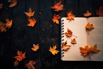 top view opened notebook with autumn leaves on wooden background. diary for memoirs concept - obrazy, fototapety, plakaty