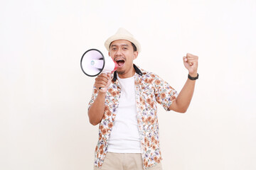 Happy Excited Asian adult man tourist holding a megaphone while screaming. Concept of travel. Isolated on white background