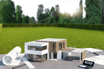 Modell eines modernen Hauses mit Grundstück im Hintergrund - obrazy, fototapety, plakaty