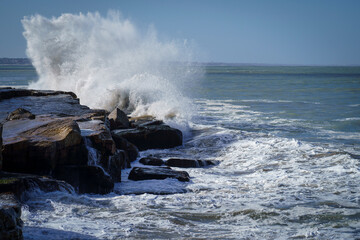 View of raves crashing on rocks in Mar del Plata, Argentina