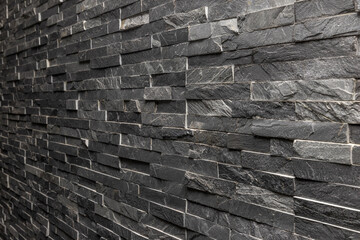 dark slate striped stone wall