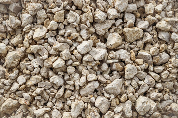Stone gravel on a construction site as a background. Texture