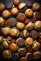 Top view of many different beef burgers with tomatoes on a black background. Fast food, Restaurant concepts