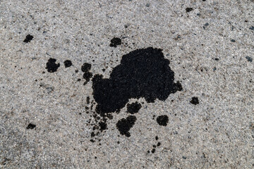 Dirty oil stain on asphalt