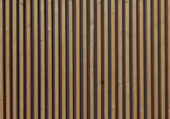 Wooden background.Yellow and dark background of the fence from the rails - obrazy, fototapety, plakaty