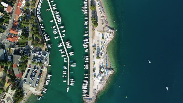 Aerial footage of the cityscape of the coastal city of Crikvenica on the Adriatic Sea, Croatia