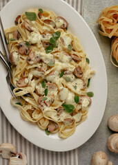 fettuccine with champignons, basil, in cream sauce, homemade, no people,