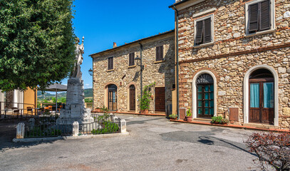 The beautiful village of Bibbona on a sunny summer afternoon. Province of Livorno, Tuscany, Italy.