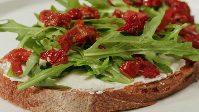 American pastrami sandwich in New York ham meet cuts. chef cooking Famous thick cut sous vide beef sandwich on restaurant cafe kitchen. Bread with curd cheese. Studio shot close up.