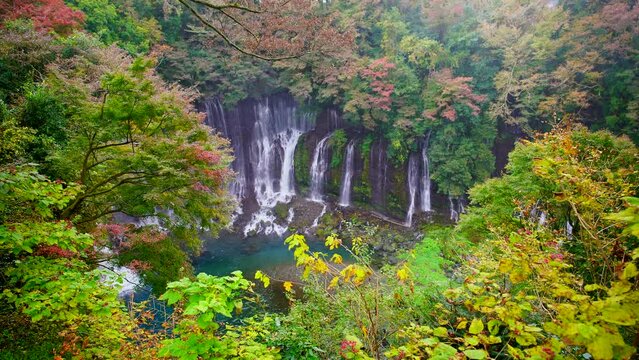 Shiraito waterfall with rainbow in Autumn, Shizuoka, Japan