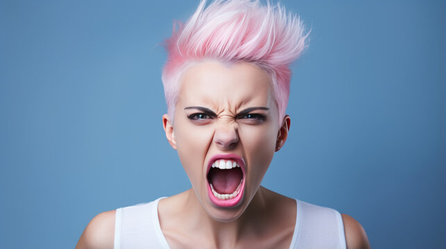Angry woman screams against a blue background