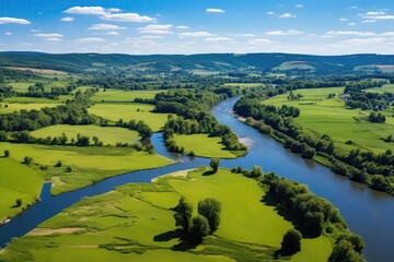Beautiful Aerial Picture Of Verdant Meadows And The Seine River In Rural France, In The Val Doise Department Of The Ile De France Region