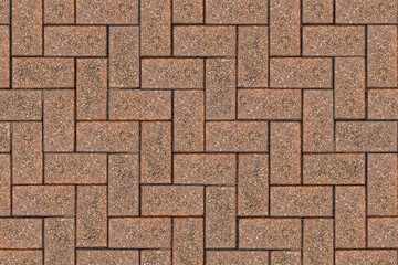 Top view of a red brick paving stone