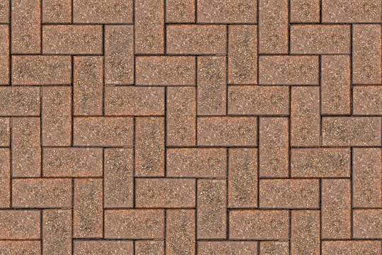 Fototapeta Top view of a red brick paving stone