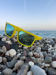 Fototapeta na wymiar Sunglasses on the beach. Antalya. Turkey.