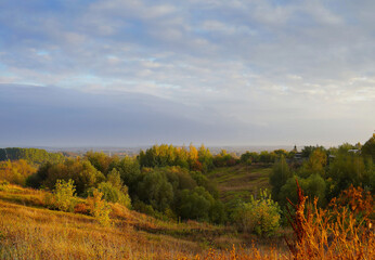 Beautiful landscape with autumn view of meadows and hills