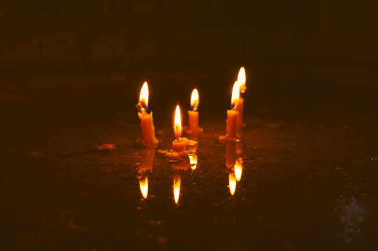 burning candles in the dark