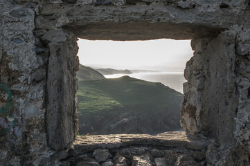 The Cantabrian coast through an old window.