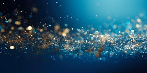 Blue Background Holiday: Abstract Dark Blue and Gold Particles with Glistering Holiday Shine. Golden Light and Bokeh on Navy Blue Background. Gold Foil Texture.