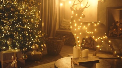 Gifts box with ribbon and bow under Christmas tree at home closeup. Presents container wrapped and decorated on floor in living room. Surprise for family members and Xmas holiday celebration symbol