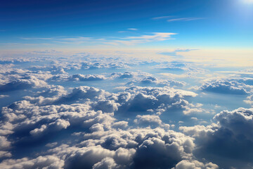 Serene aerial sky view. Cloud patterns. Tranquil atmosphere seen from above. Nature's high-altitude beauty.

